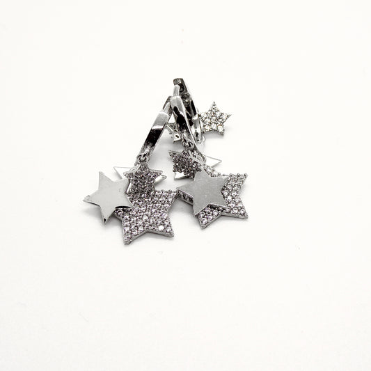Orecchini cerchi in argento 925 con stelle pendenti